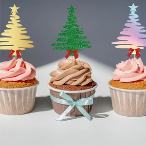 Set of three sparkling Christmas tree cupcake toppers with festive red bows in gold and green