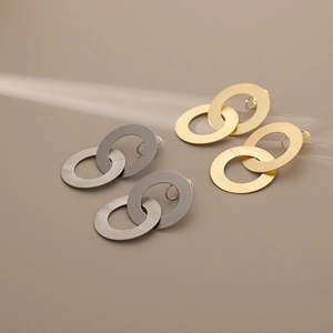 Boucles d'oreilles doubles anneaux entrelacés en métal brossé doré et argenté mat