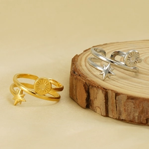 Minimalist 18K gold and silver stainless steel star and sunburst open ring set