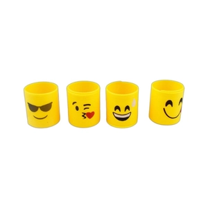 Four yellow emoji rainbow springs for kids, featuring assorted smiley face prints