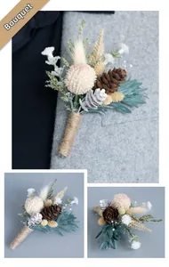 Detail of pine cone boutonniere with dried flowers and jute wrapped stem on a suit