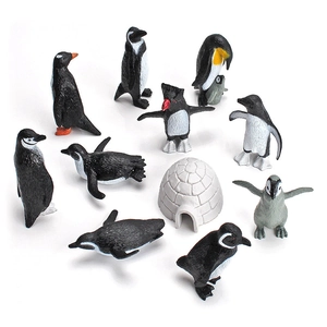Realistic 11-piece penguin figurine set with miniature igloo for educational play