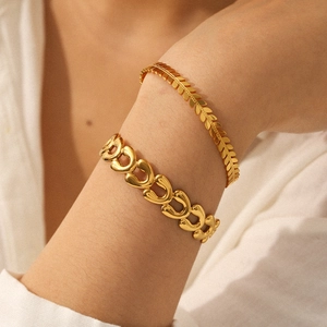 Elegant 18k gold plated stainless steel leaf cuff and geometric chain bracelet set