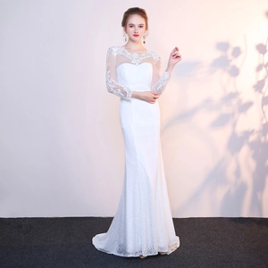 Elegant white lace long sleeve mermaid wedding dress with floral embroidery and mesh details