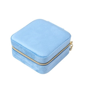Portable light blue velvet square jewelry travel case with secure gold zipper closure