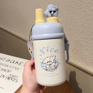 Detail view of cartoon stainless steel thermos cup with straw and adjustable strap