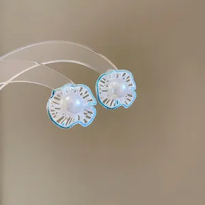 Blue enamel flower earrings with pearls and silver hollow petal design for women