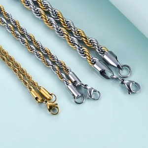 Macro detail of various thickness stainless steel rope chains with lobster clasps