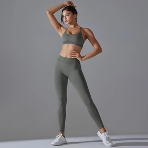 Detailed view of seamless high-waist yoga set with racerback bra in dark olive green