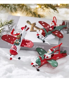 Three-piece metal Christmas airplane ornaments featuring Santa, snowman, and reindeer figures