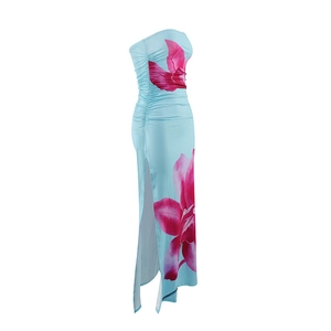 Detail of light blue floral strapless maxi dress with side slit and waist pleats