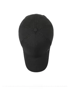 Top down macro view of dark grey baseball cap showing textured fabric and metal logo detail