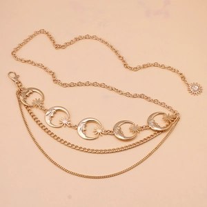 Detailed view of gold multi-layer sun flower waist chain with moon and star charms