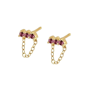 Close-up of gold dangle earrings with three pink stones and fine chain drop detail