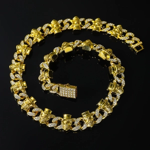 Hip hop gold Cuban chain necklace with iced out skull links and sparkling diamonds
