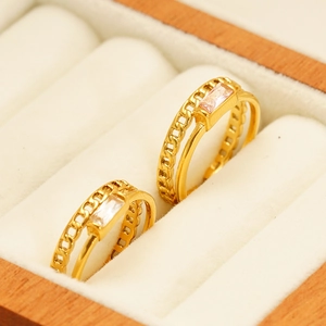Gold double-layered stainless steel ring set with rectangular zircon in a jewelry box