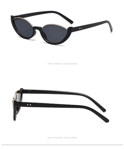 Detailed views of women's cat eye sunglasses with black frames and gold metal accents