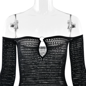 Detail of black mesh off-shoulder bodysuit featuring front cutout and metal ring accent
