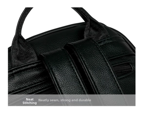 Detail of reinforced stitching on black lychee leather backpack with a sturdy top handle