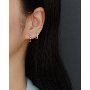 Close-up of S925 silver U-shape earrings with colorful stones and small white diamonds