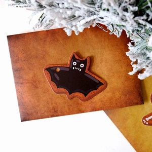 Gingerbread-style bat gift tag with cute cartoon details for Halloween cookie decor