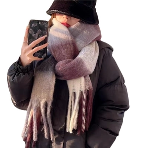Colorful plaid tassel scarf in grey and purple faux cashmere worn with a winter jacket