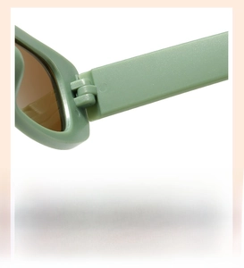 Detail of sturdy hinge and smooth temples on matte green kids sunglasses for comfort