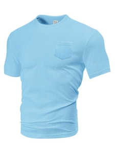 Macro shot of light blue waffle texture fabric and crew neck label with material info