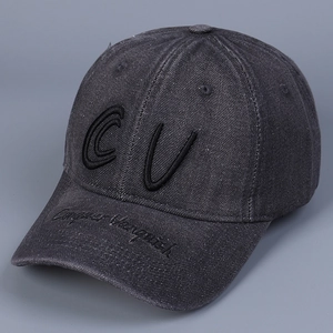 Detail of dark grey denim baseball cap with 3D CV embroidery and stitched visor text
