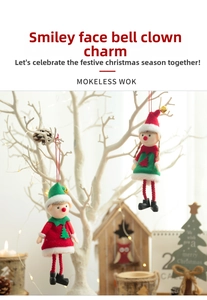 Close-up of cute Christmas elf dolls with bells hanging on festive white branches