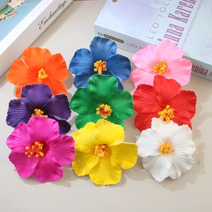 Set of 9 colorful hibiscus flower hair clips for beach vacations and floral hair styling
