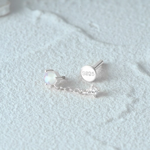 Detailed macro view of S925 sterling silver earring post featuring the material hallmark