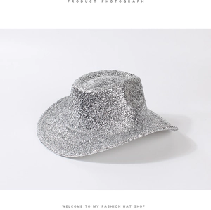 Close-up of shiny silver glitter texture on western cowboy hat for parties