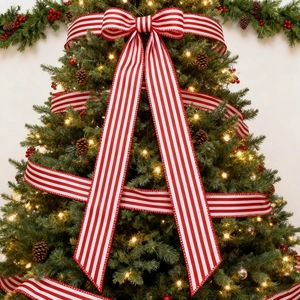 Classic red and white striped Christmas ribbon with a large matching bow for tree decor