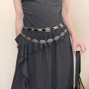 Retro geometric oval butterfly waist chain on model wearing a dark grey dress