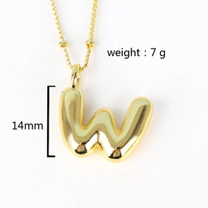 Detail of 14mm puffy golden letter W pendant with weights and dimensions