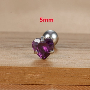 Detailed macro view of a 5mm purple heart zircon cartilage stud earring with ball back