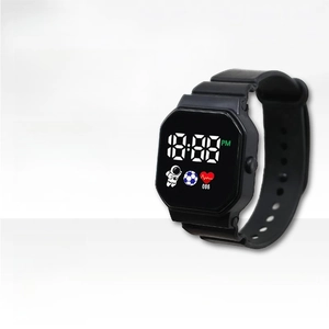Detail of square black LED watch screen with astronaut icons and silicone strap