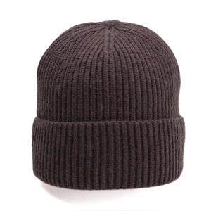 Close-up of the thick ribbed knit texture on a warm dark brown winter beanie hat