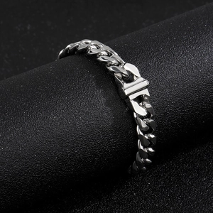 Close-up of a 10mm silver stainless steel Cuban link chain with a polished finish