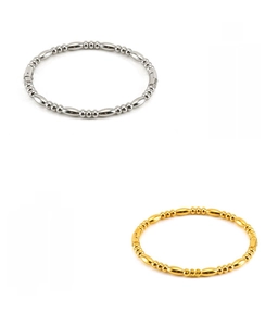 Detailed view of lead-free and nickel-free steel bracelets with a durable gold finish