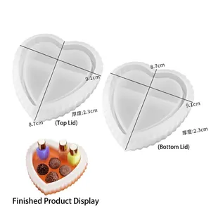 Macro view of heart-shaped silicone resin mold showing 9.1x8.7cm dimensions and lid detail