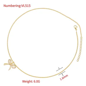 Elegant gold layered necklace with pearl-set bow pendant for women minimalist style
