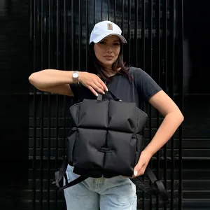 Sac à dos matelassé noir tendance pour femme, grande capacité et style urbain moderne