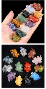 Detailed macro view of assorted natural crystal and gemstone hand-carved turtle figurines