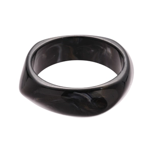 Minimalist geometric black resin bangle with marble texture in asymmetric thick design