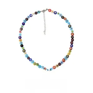 Detail of colorful bohemian beaded necklace with white daisy pendant and lobster clasp