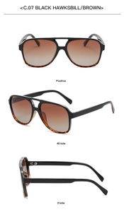 Detailed view of polarized aviator sunglasses in black hawksbill frame and brown lenses