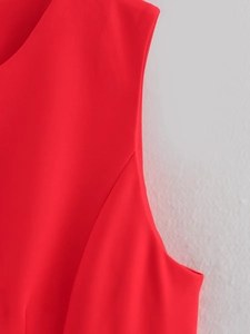 Detailed close-up showing the premium red twill fabric texture and fine sewing of the vest