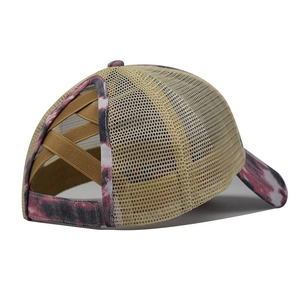 Detail of pink tie-dye ponytail baseball cap featuring three-layer elastic cross bands